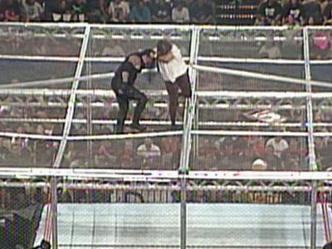 The Undertaker throws Mankind off the top of the Hell in a Cell: June 28, 1998 King of the